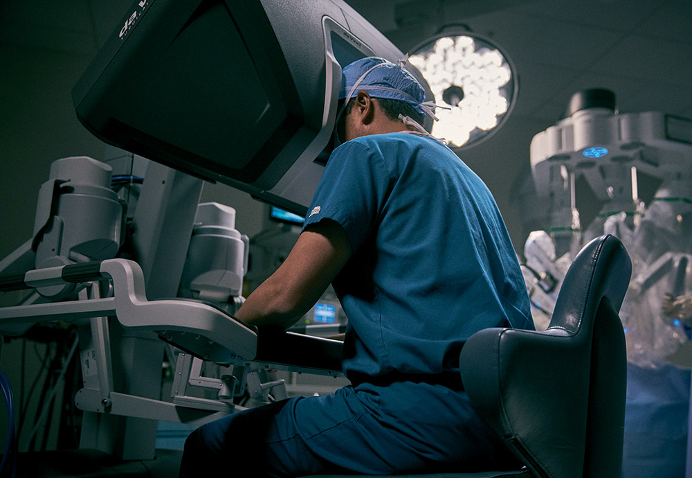 55 intuitive da vinci surgeon at surgeon consolejpg